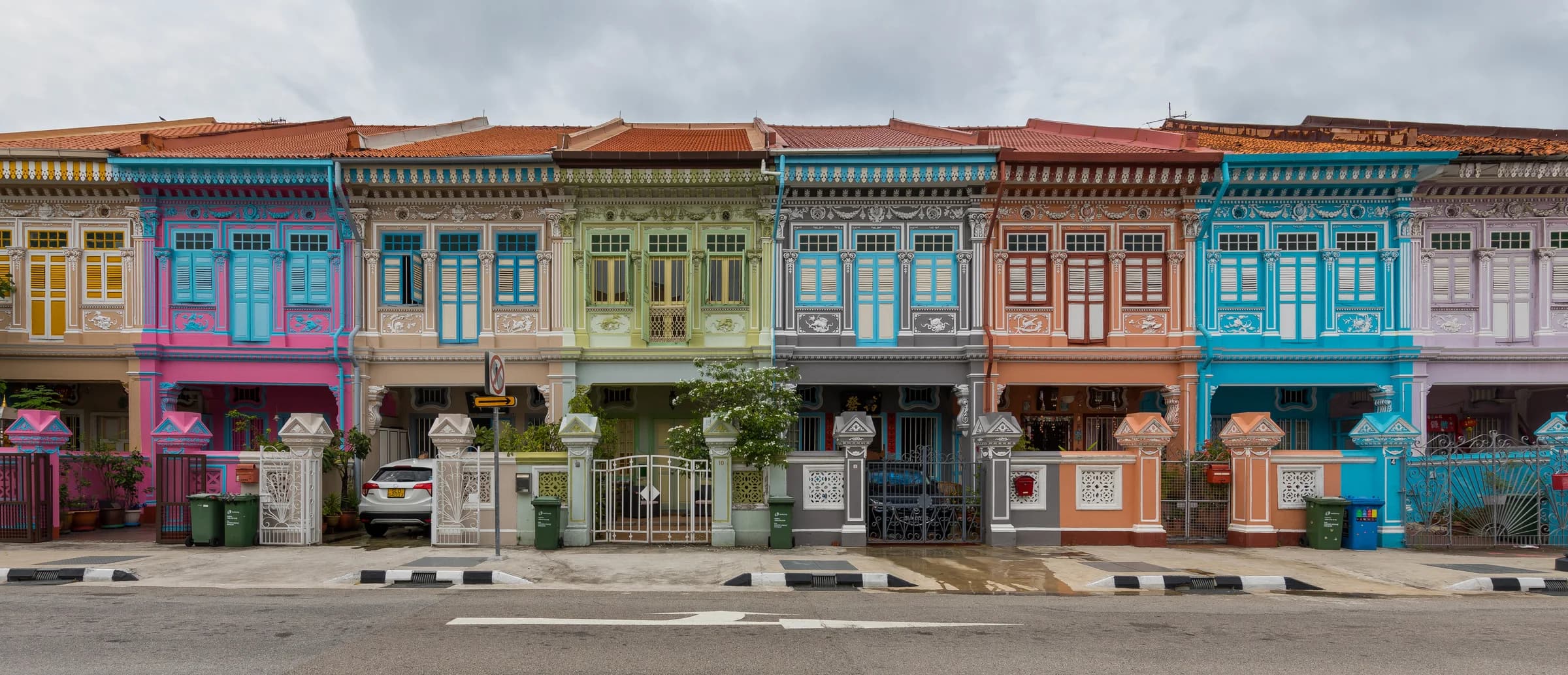 Colorful Peranakan shophouses lining Koon Seng Road in Singapore