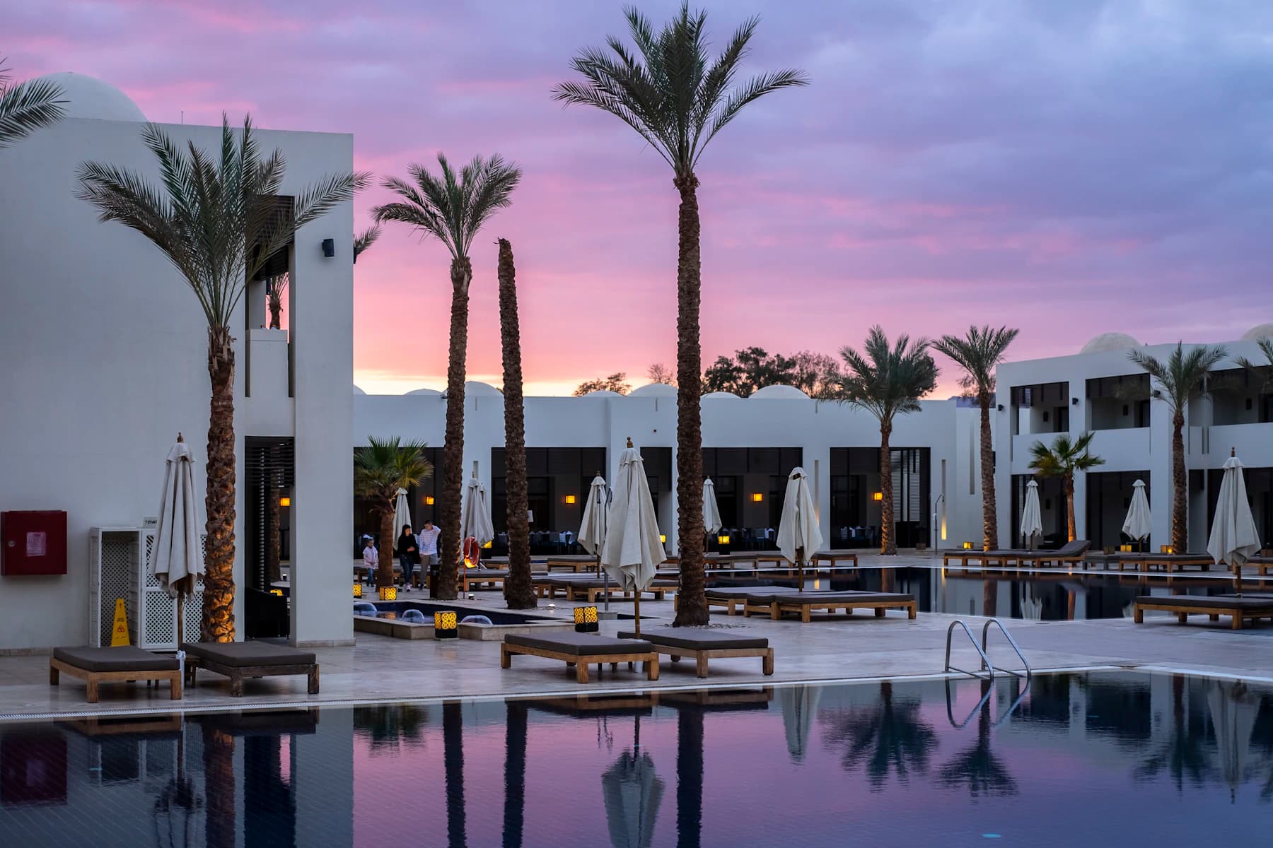 A landscaped outdoor resort pool